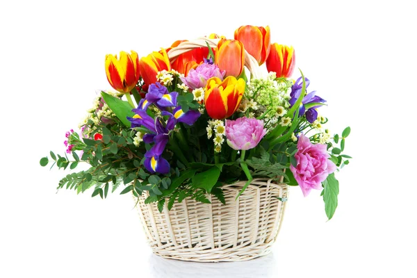 Beautiful bouquet in wattled basket — Stock Photo, Image