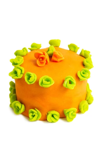 Brown cake decorated with green florets around — Stock Photo, Image