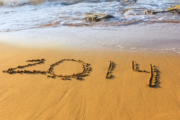 Date of new year on sand in surf — Stock Photo, Image