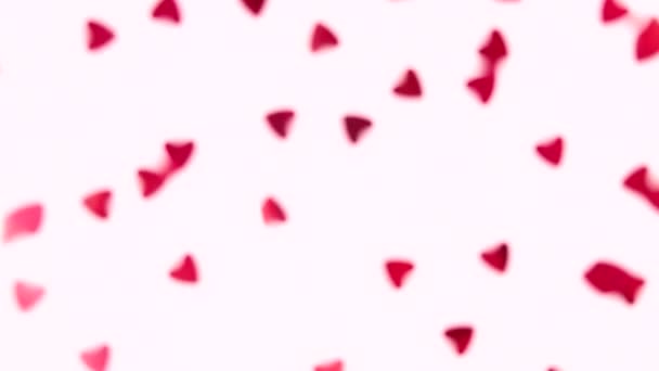 Het Concept Van Valentijnsdag Rode Hartvormige Pailletten Draaien Een Roze — Stockvideo
