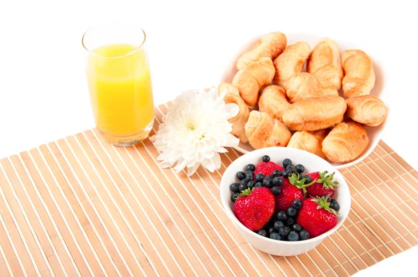 Breakfast with berries,orange juice and croissant — Stock Photo, Image