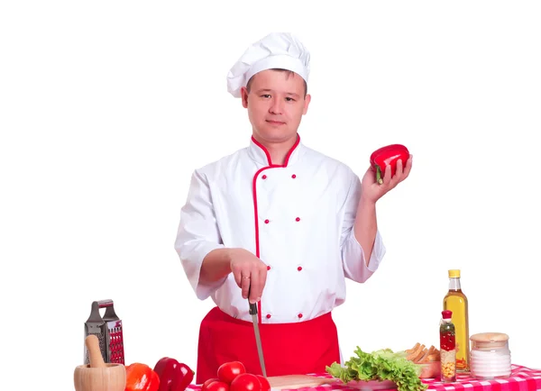 Schöner Mann, der zu Hause in der Küche kocht — Stockfoto