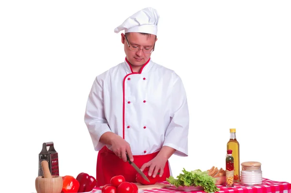 Bonito homem cozinhar na cozinha em casa — Fotografia de Stock