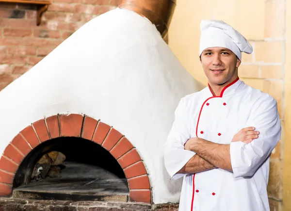 Retrato de um cozinheiro na cozinha — Fotografia de Stock