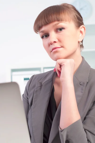 Woman works in the office — Stock Photo, Image