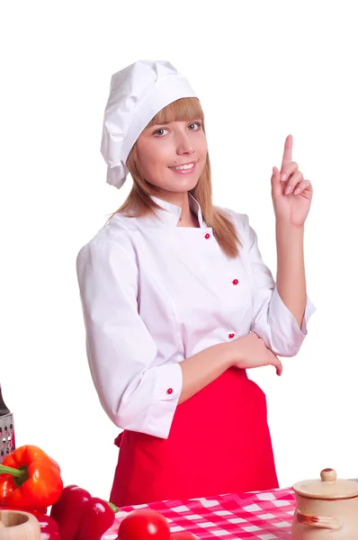 Attraktiva cook kvinna en över vit bakgrund — Stockfoto