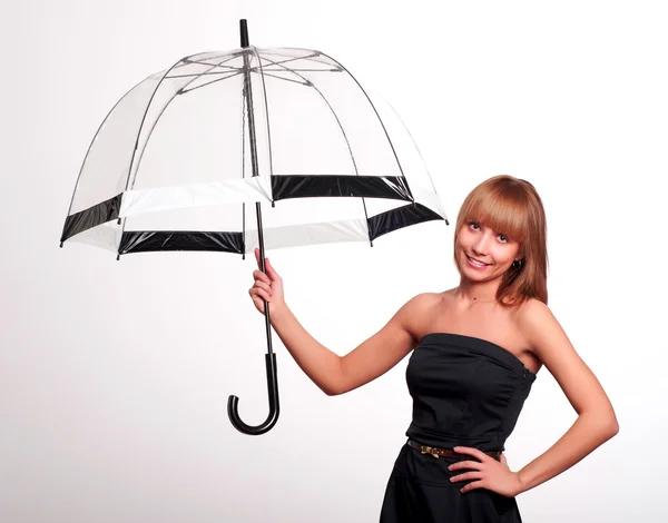 Frau mit Regenschirm — Stockfoto