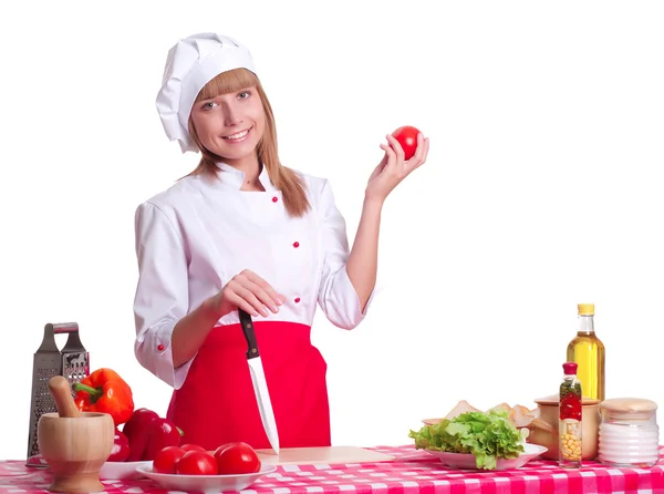 Attraktive Frau kocht Stockfoto