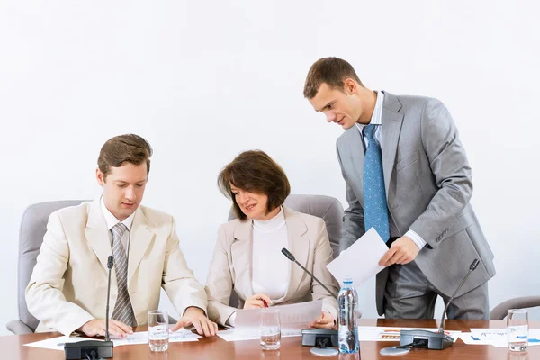 Group of business discussing documents — Stock Photo, Image