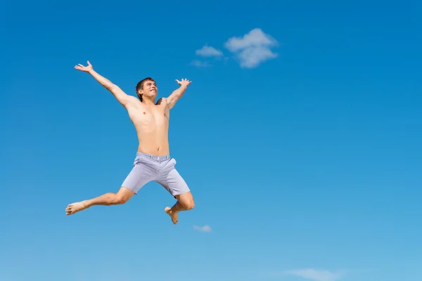 Young man jumping — Stock Photo, Image