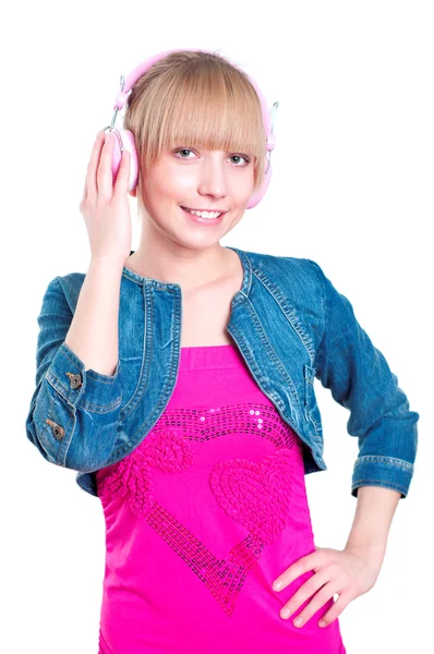 Young attractive woman listing to music — Stock Photo, Image