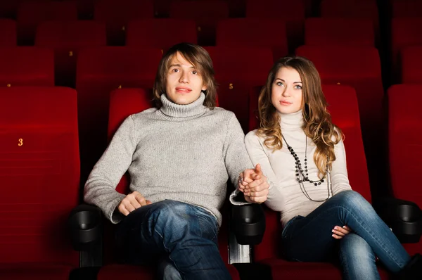 Young couple in the cinema — Stock Photo, Image