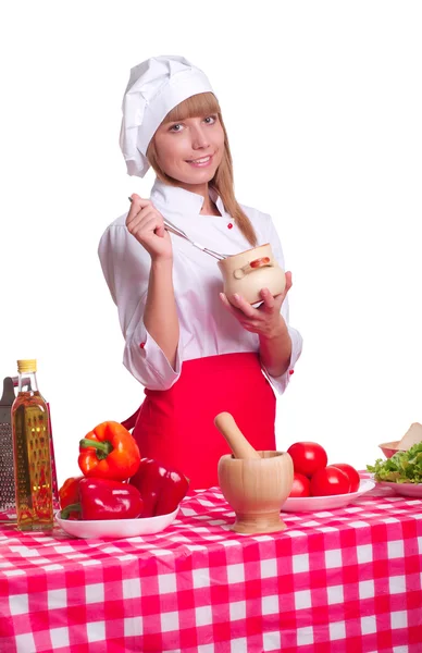 Attraktive Köchin mit weißem Hintergrund Stockfoto