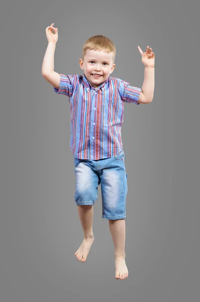 Niño saltando — Foto de Stock