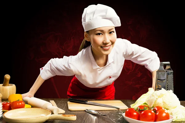 Portrait Asian woman cooks — Stock Photo, Image