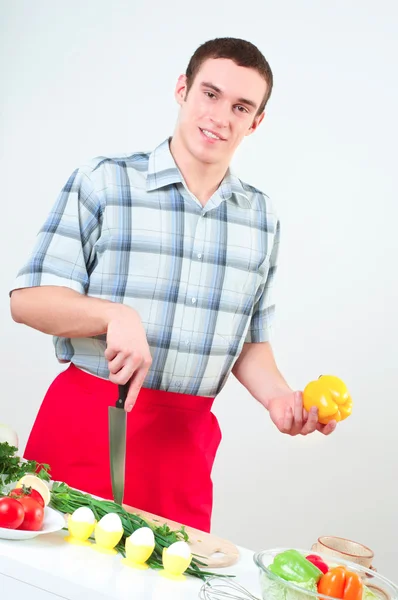Portrait of a young man, make meal — Stock Photo, Image