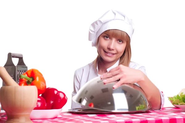 Aantrekkelijke cook vrouw een witte achtergrond — Stockfoto