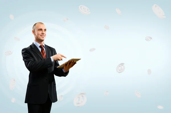 Business man holding a table — Stock Photo, Image