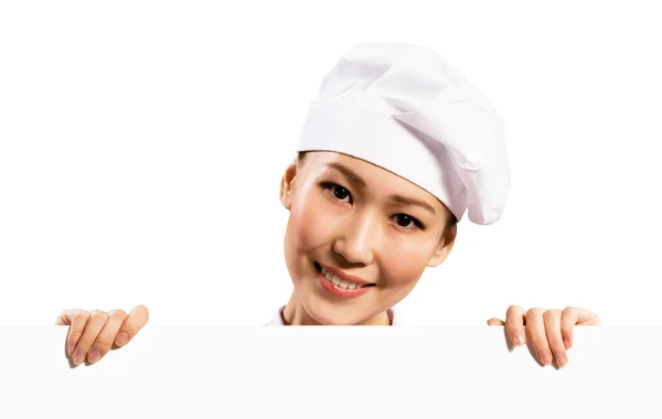 Kvinnliga kock håller en affisch för text — Φωτογραφία Αρχείου
