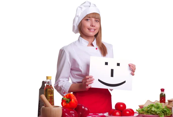 Mulher cozinheiro atraente um fundo sobre branco — Fotografia de Stock