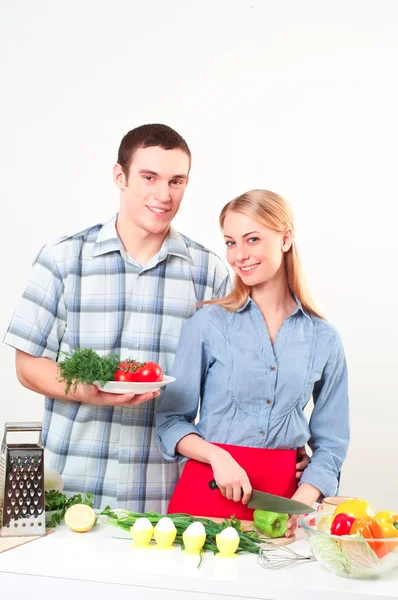 Couple of cooking together Stock Image