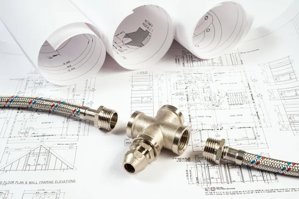 Plumbing and drawings, construction still life — Stock Photo, Image