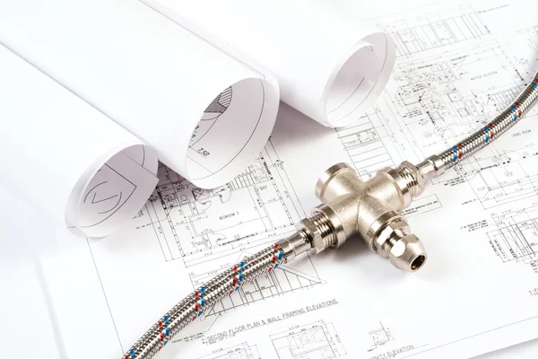 Plumbing and drawings, construction still life — Stock Photo, Image