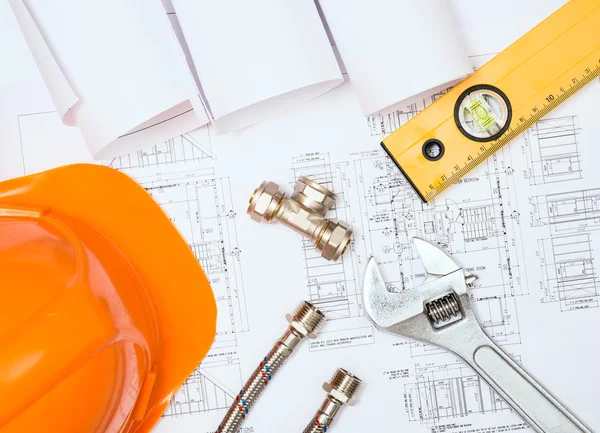 Plumbing and drawings, construction still life — Stock Photo, Image