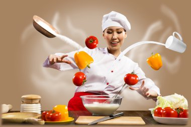 Asian female chef in the kitchen conjures clipart