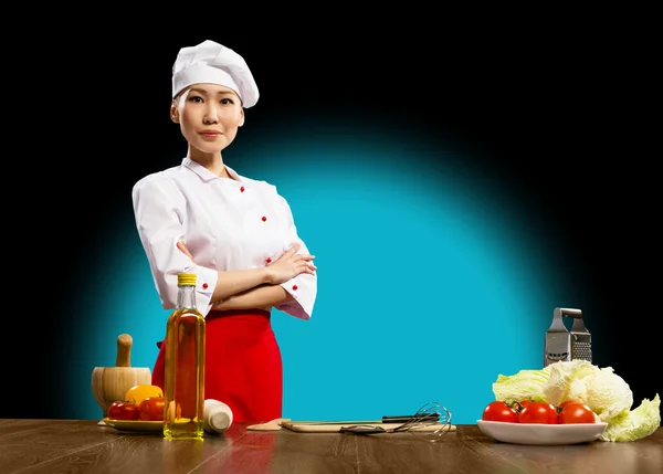 Portrait Asian woman cooks — Stock Photo, Image