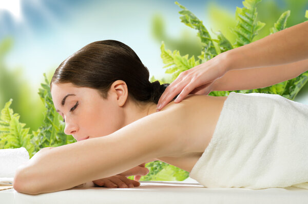 beautiful spa woman lying on the couch