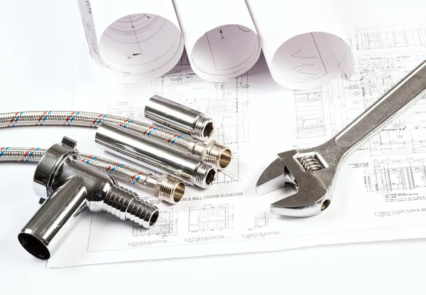 Plumbing and drawings, construction still life — Stock Photo, Image