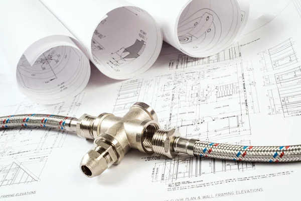 Plumbing and drawings, construction still life — Stock Photo, Image