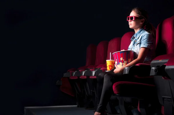 Woman at the cinema — Stock Photo, Image