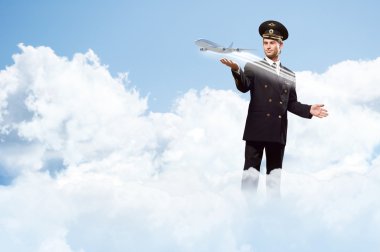 Pilot uçağa el uzatılması şeklinde