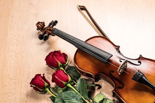 Skrzypce, róża i muzyka książki — Zdjęcie stockowe