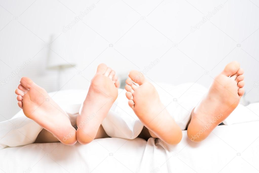 couple feet in bed