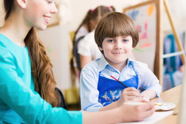 Teacher and student in the classroom — Stock Photo, Image