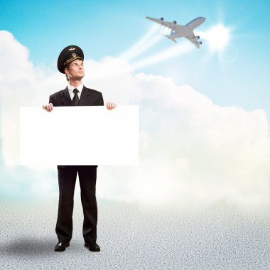 Pilot boş bir billboard holding şeklinde