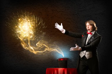 Magician sihirli şapkadan neden olur.