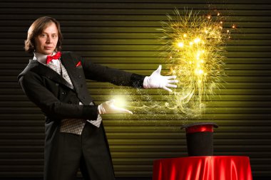 Magician sihirli şapkadan neden olur.