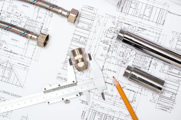 Plumbing and drawings, construction still life — Stock Photo, Image