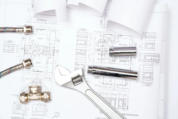 Plumbing and drawings, construction still life — Stock Photo, Image