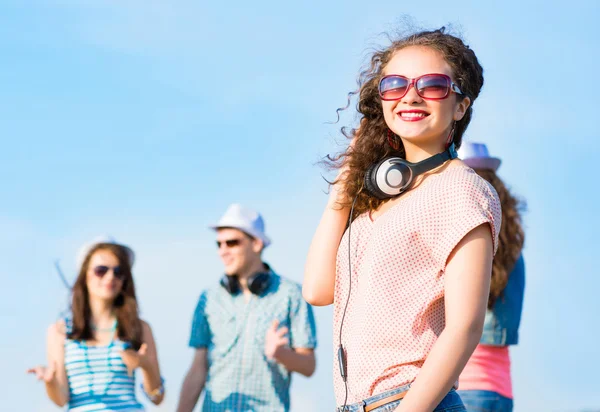 Young woman with headphones — Stock Photo, Image