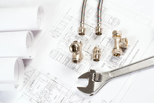 Plumbing and drawings, construction still life — Stock Photo, Image