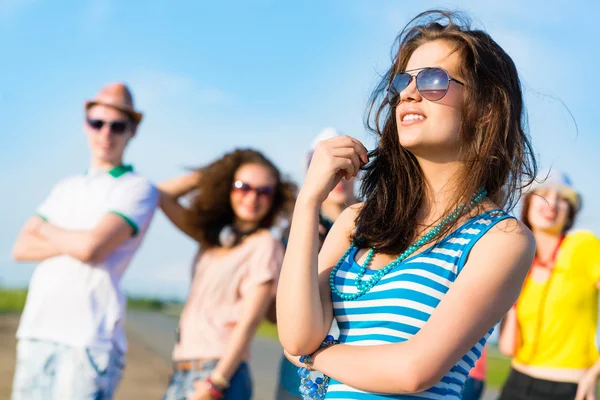 Stylish young woman in sunglasses — Stock Photo, Image