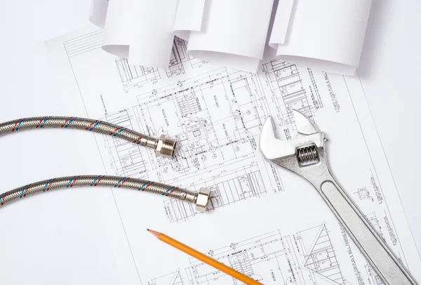 Plumbing and drawings, construction still life — Stock Photo, Image