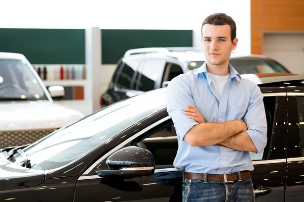 Man standing near a car — Stock Photo, Image