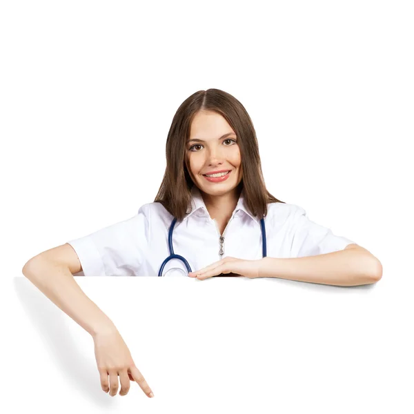 Young woman doctor with a blank banner — Stock Photo, Image