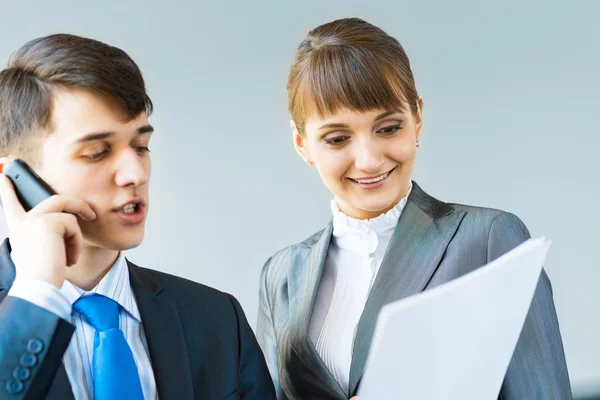 Two business partners discussing reports — Stock Photo, Image